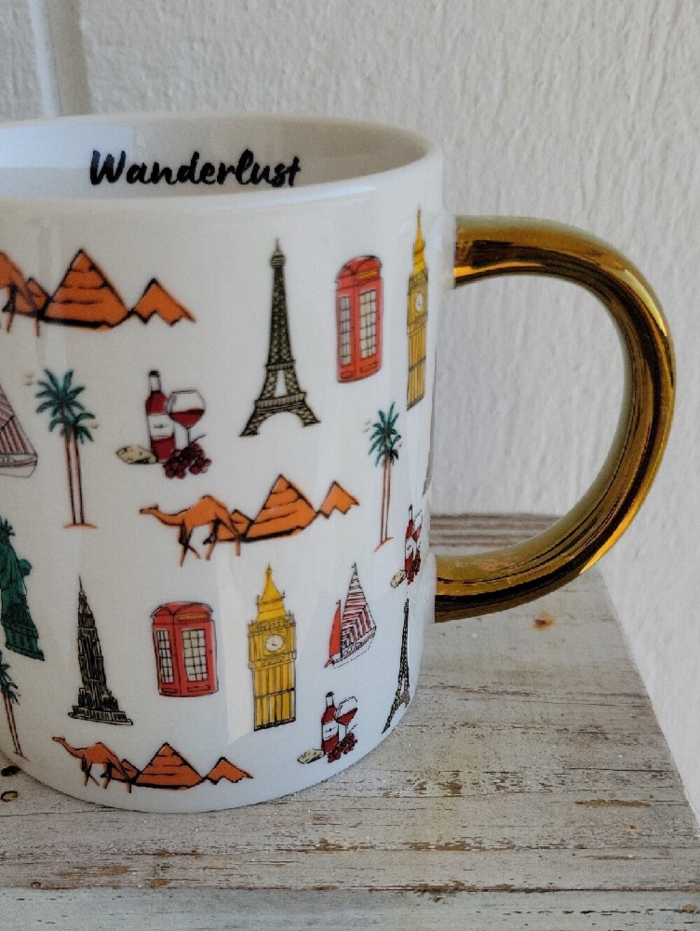 Wanderlust White Stoneware Mug with Gold Handle and Multicolor Travel Icons - Picture 4 of 8